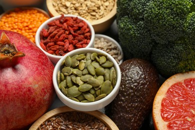 Photo of Superfood. Different healthy food products on table, closeup