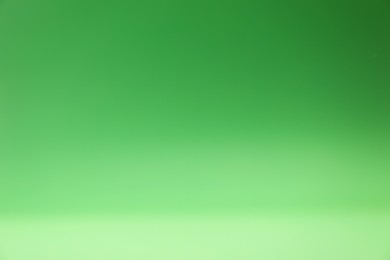 Photo of Green gradient background. Abstract color backdrop for design