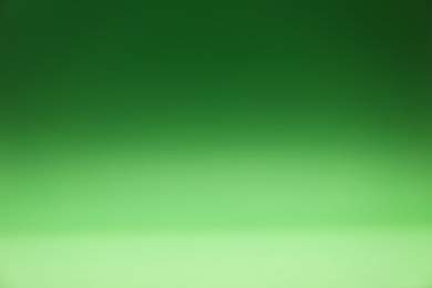 Photo of Green gradient background. Abstract color backdrop for design