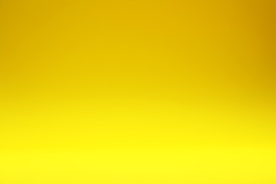 Photo of Yellow gradient background. Abstract color backdrop for design