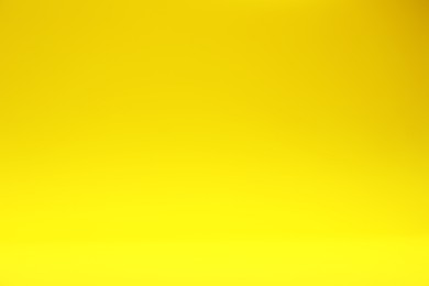 Photo of Yellow gradient background. Abstract color backdrop for design