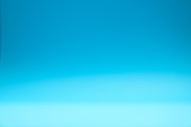 Photo of Light blue gradient background. Abstract color backdrop for design