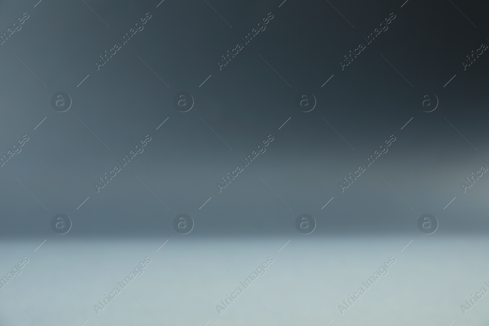 Photo of Grey gradient background. Abstract color backdrop for design