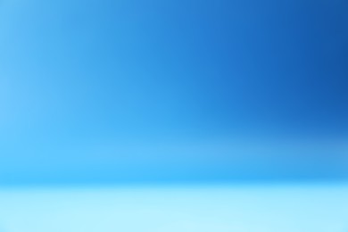 Photo of Blue gradient background. Abstract color backdrop for design