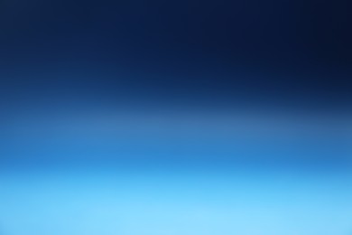 Photo of Blue gradient background. Abstract color backdrop for design