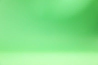 Photo of Green gradient background. Abstract color backdrop for design