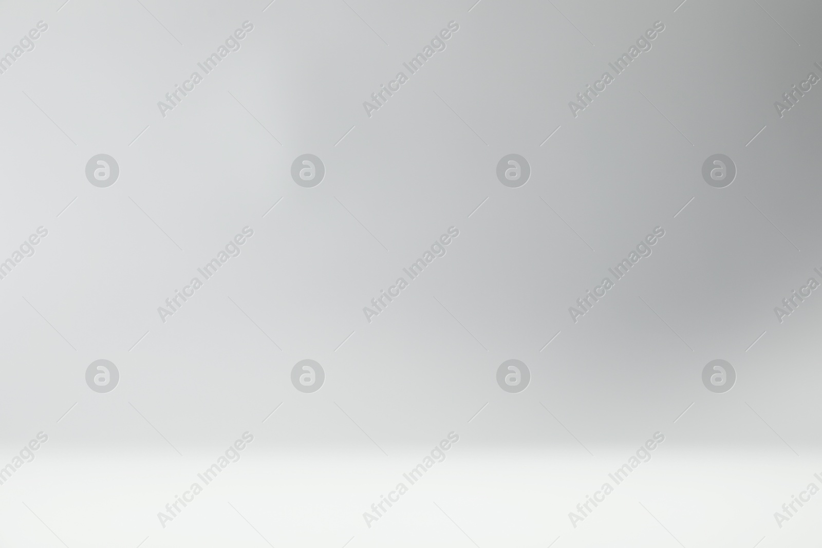 Photo of Light grey gradient background. Abstract color backdrop for design