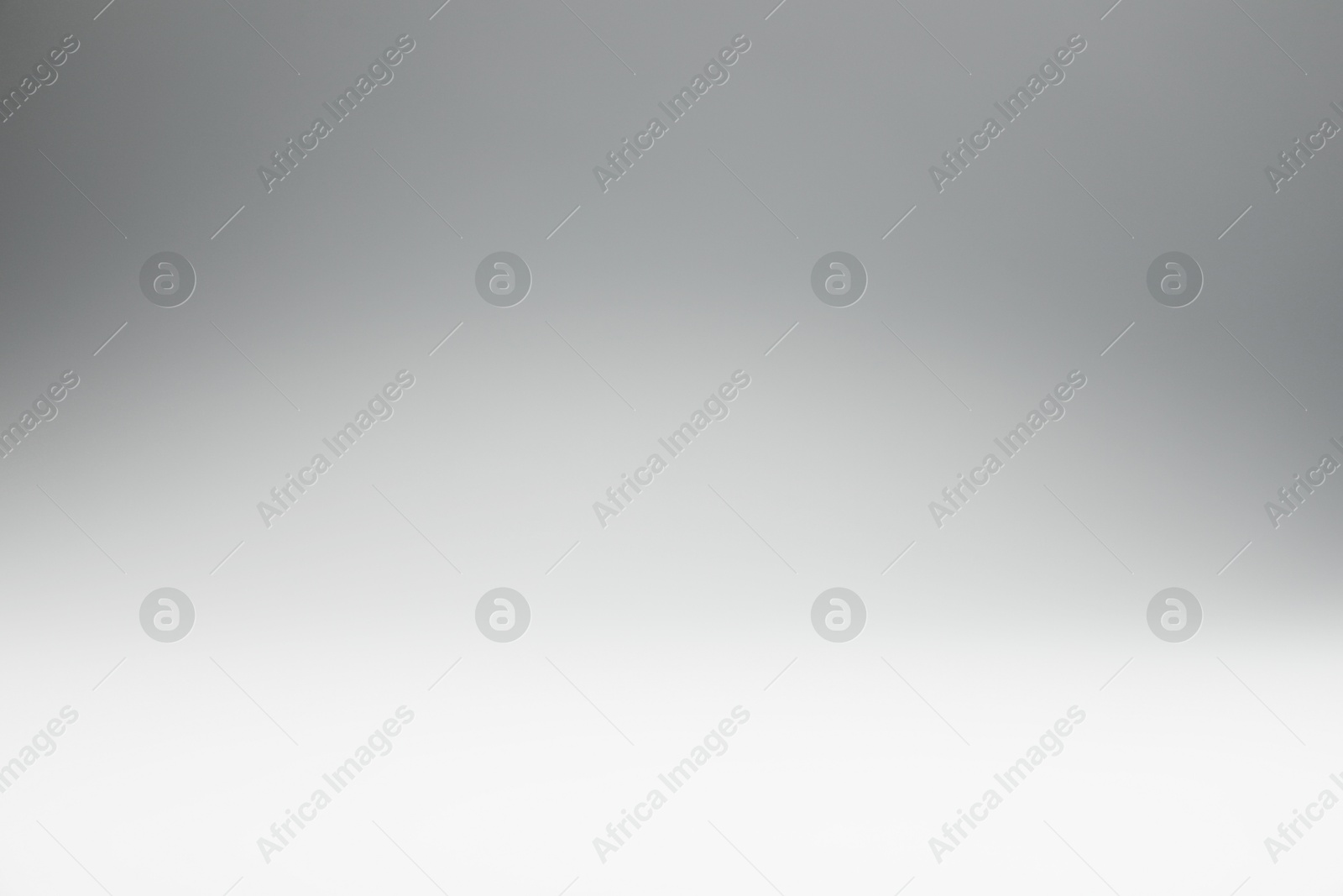 Photo of Light grey gradient background. Abstract color backdrop for design