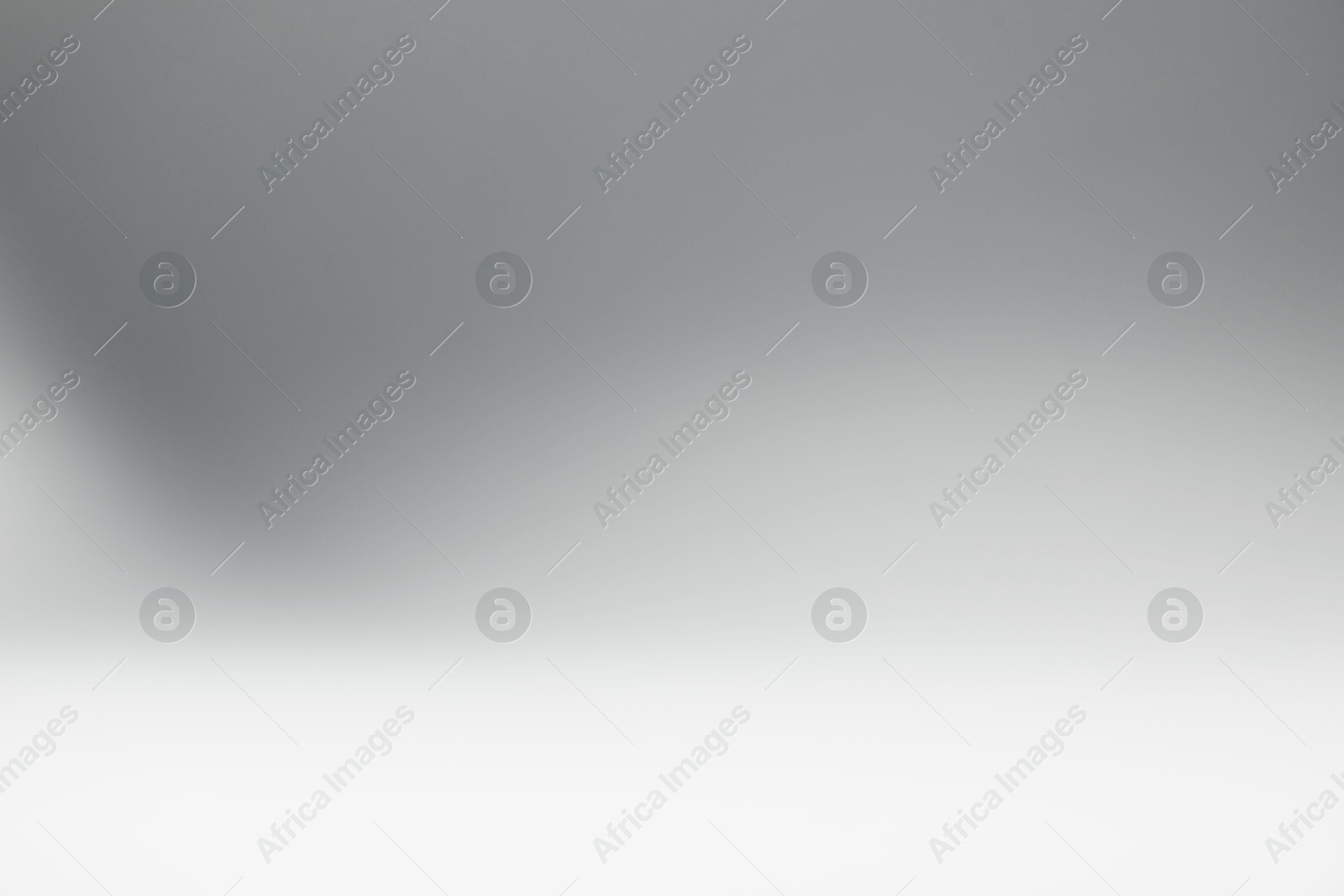 Photo of Light grey gradient background. Abstract color backdrop for design