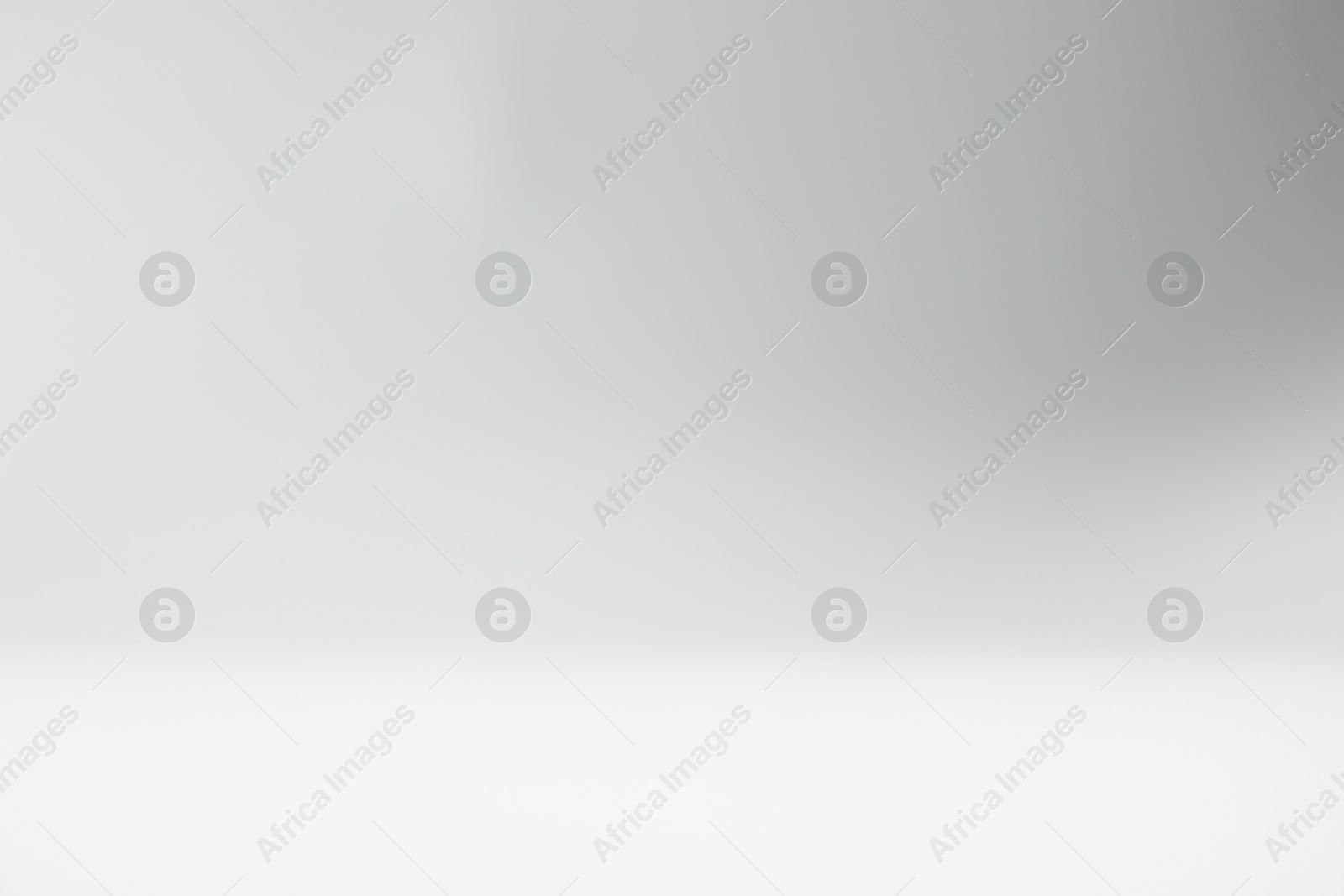 Photo of Light grey gradient background. Abstract color backdrop for design