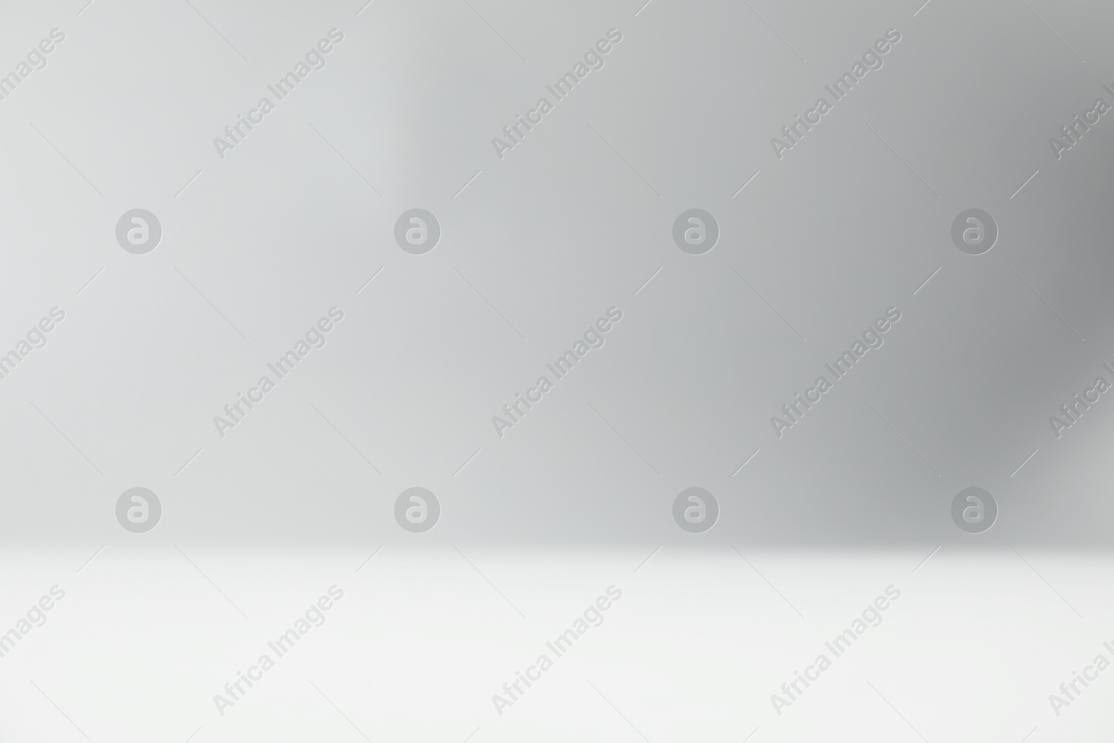 Photo of Light grey gradient background. Abstract color backdrop for design