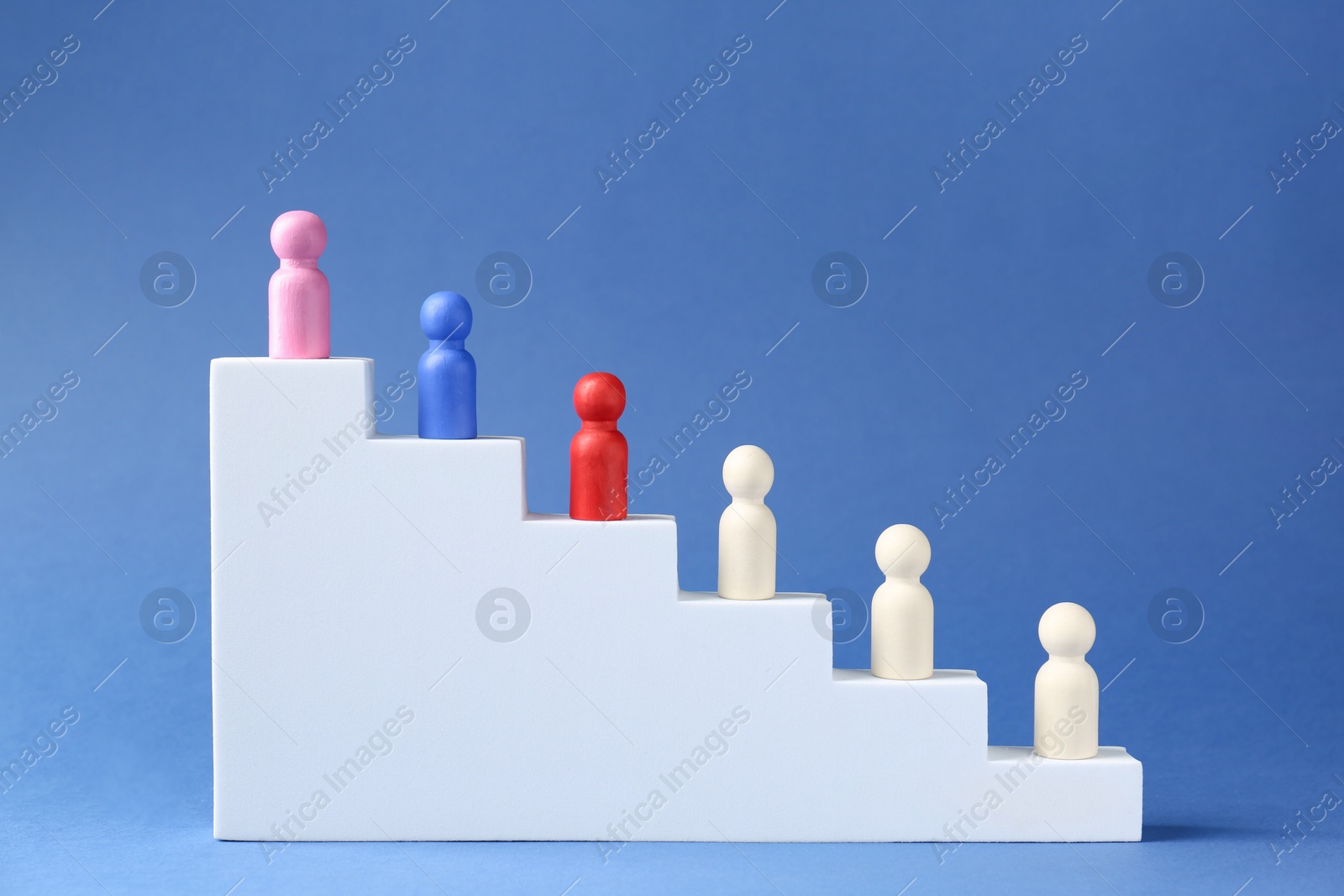 Photo of Competition concept. Human figures on ladder against blue background, space for text