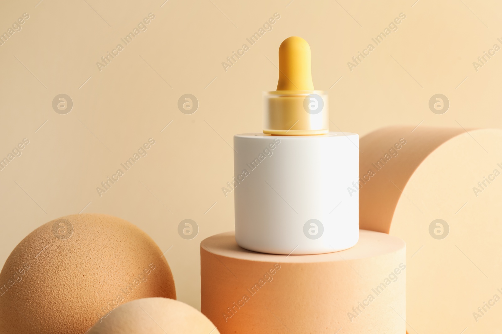 Photo of Stylish presentation of skin care product on beige background