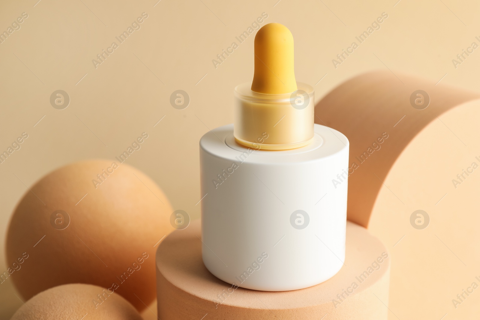 Photo of Stylish presentation of skin care product on beige background