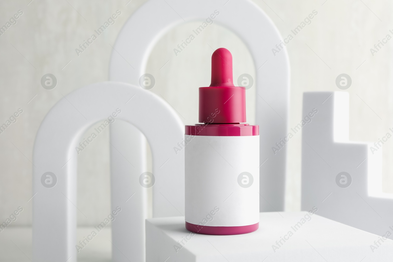 Photo of Stylish presentation of skin care product on light background