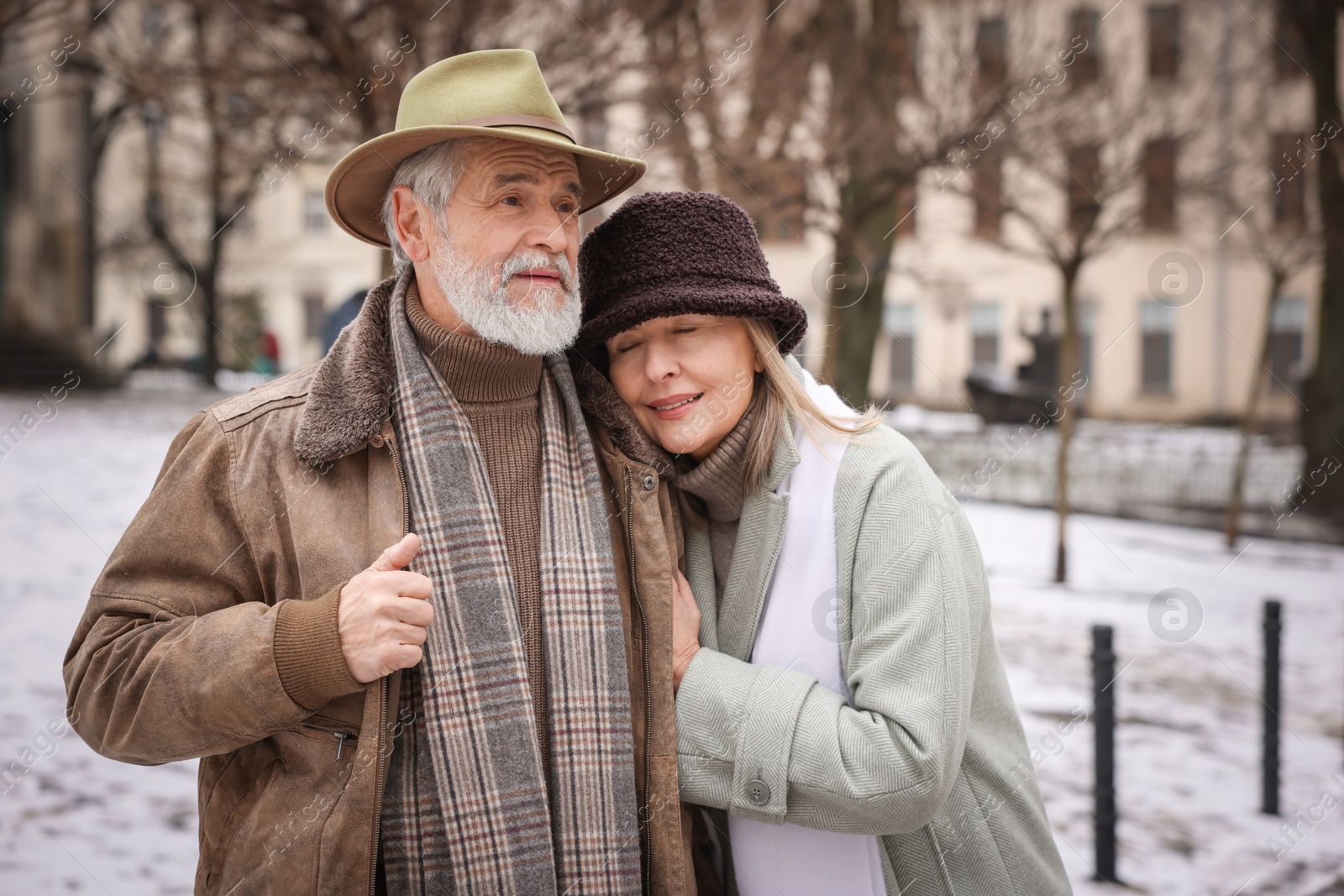 Photo of Portrait of lovely senior couple on winter day