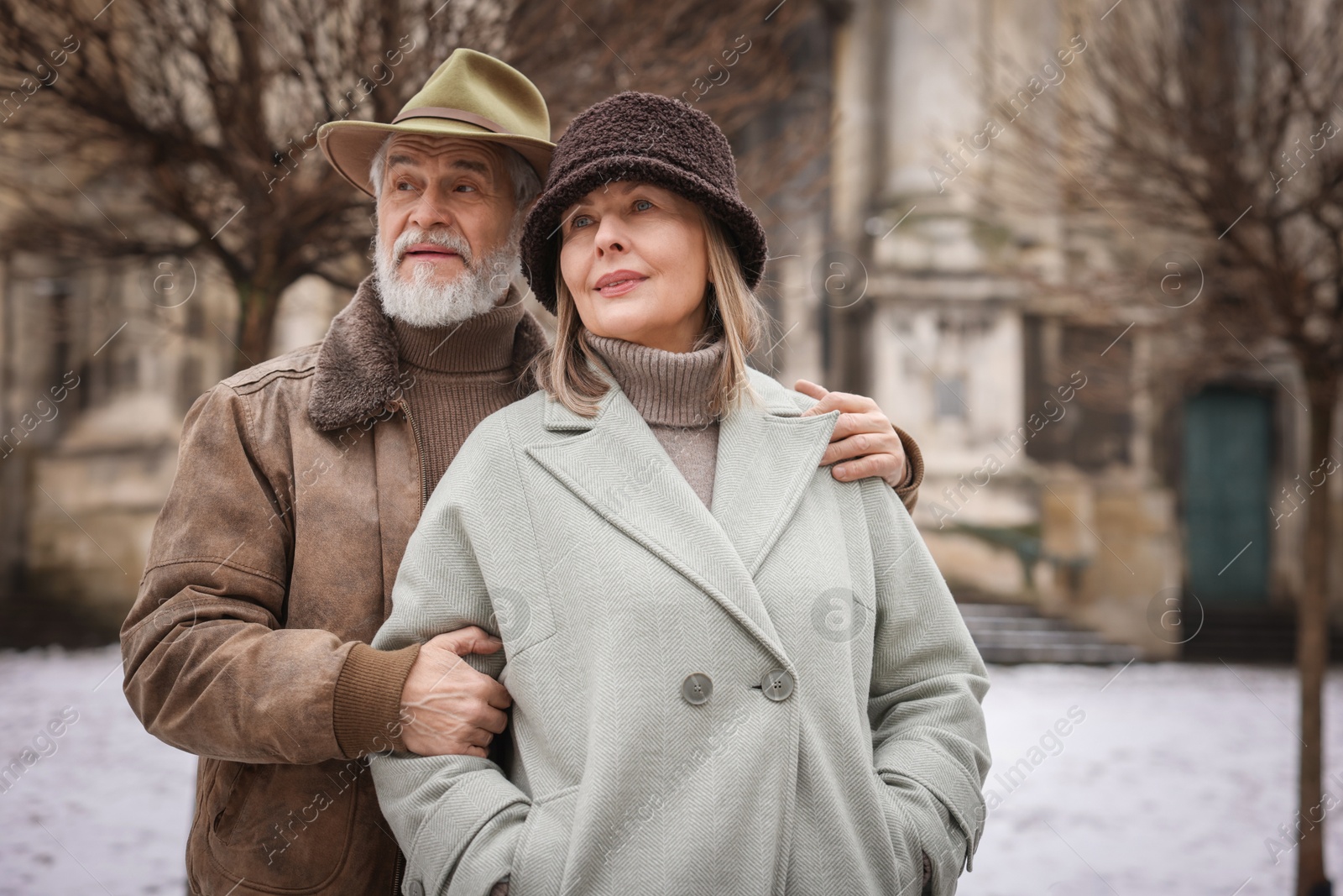 Photo of Portrait of lovely senior couple on winter day