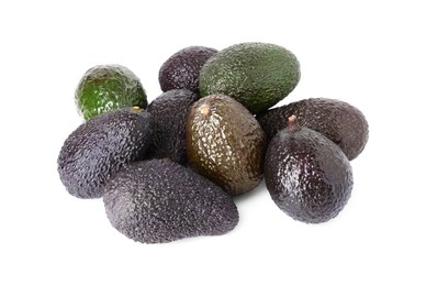 Photo of Many whole ripe avocados isolated on white