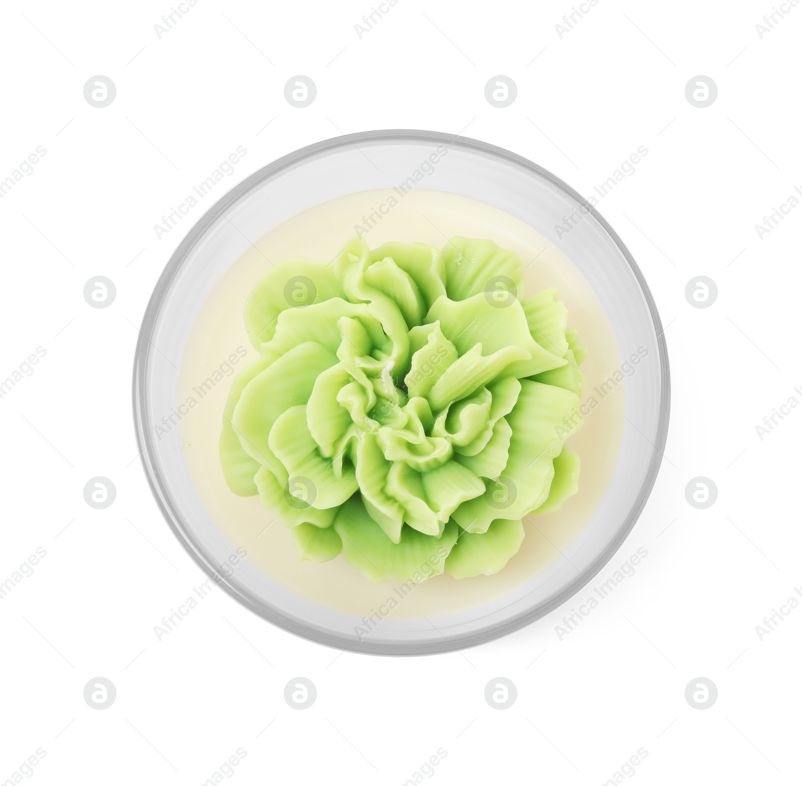 Photo of Beautiful green flower-shaped candle isolated on white, top view