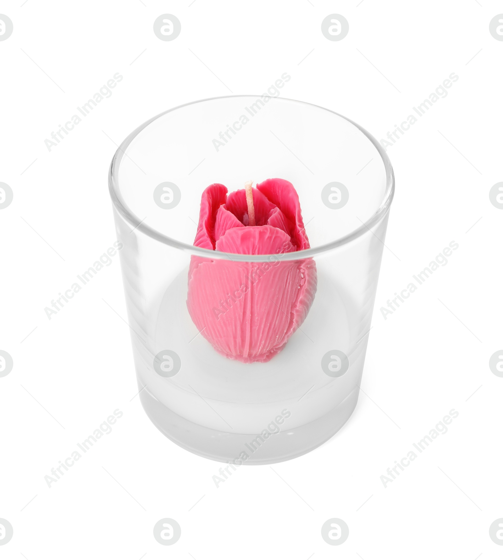 Photo of Beautiful pink flower-shaped candle isolated on white