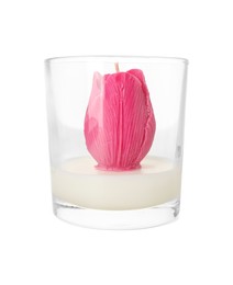 Photo of Beautiful pink flower-shaped candle isolated on white