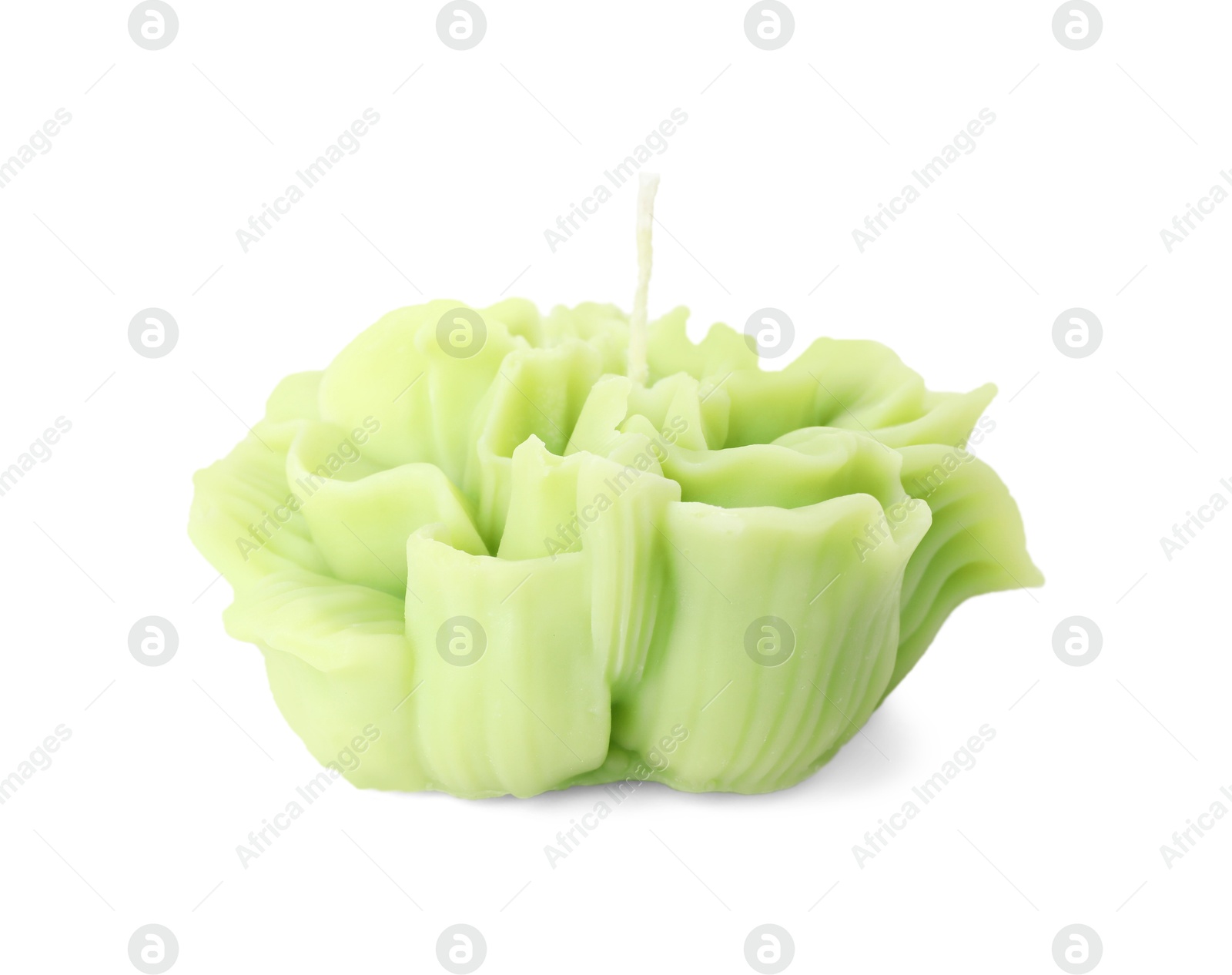 Photo of Beautiful green flower-shaped candle isolated on white