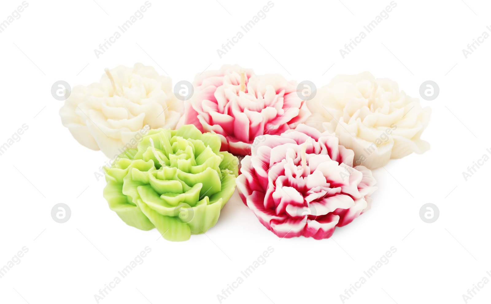 Photo of Many beautiful flower-shaped candles isolated on white