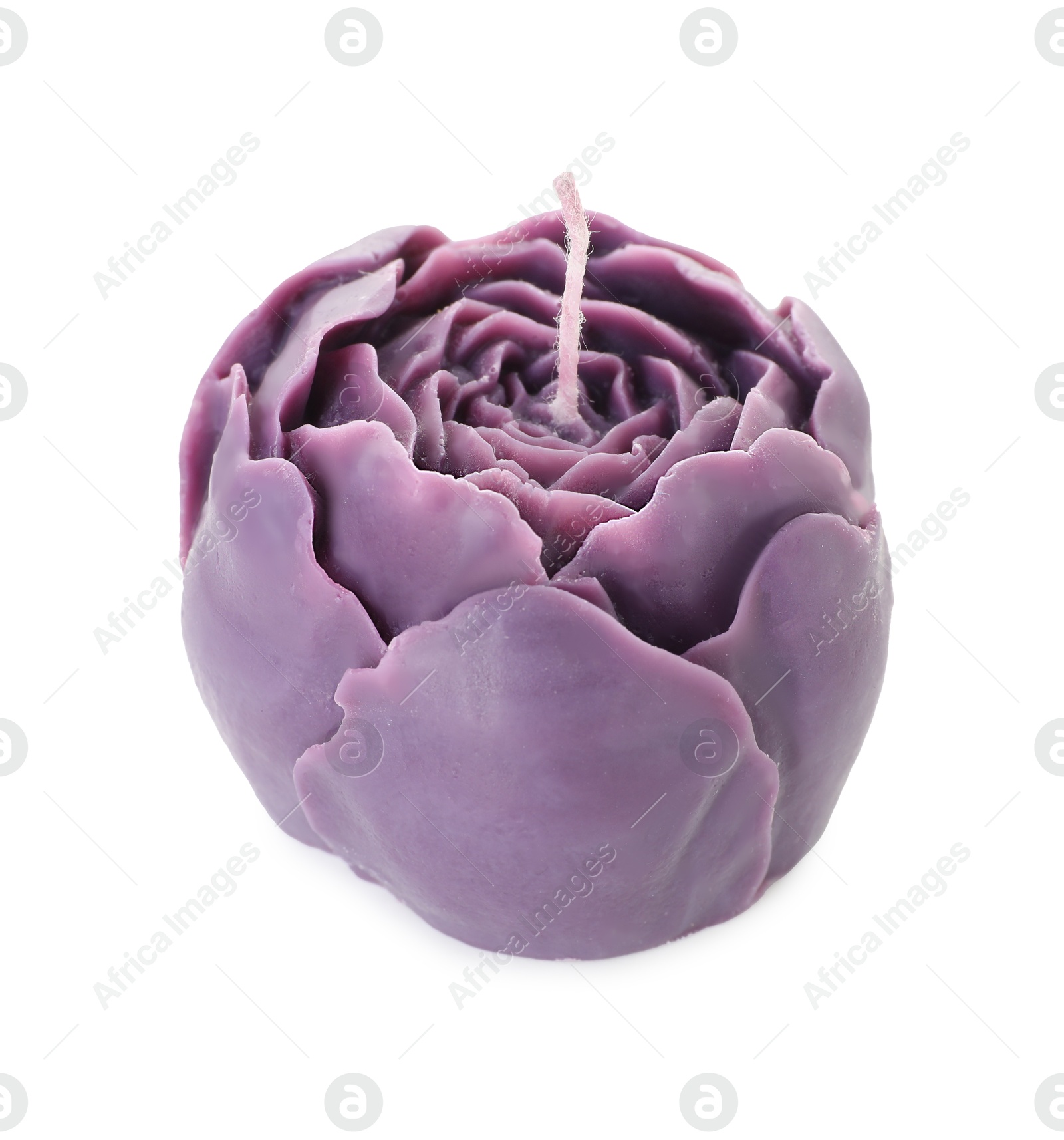 Photo of Beautiful violet flower-shaped candle isolated on white