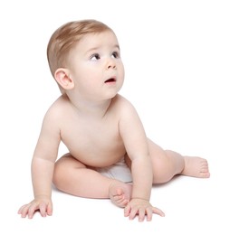 Photo of Cute little baby in diaper on white background