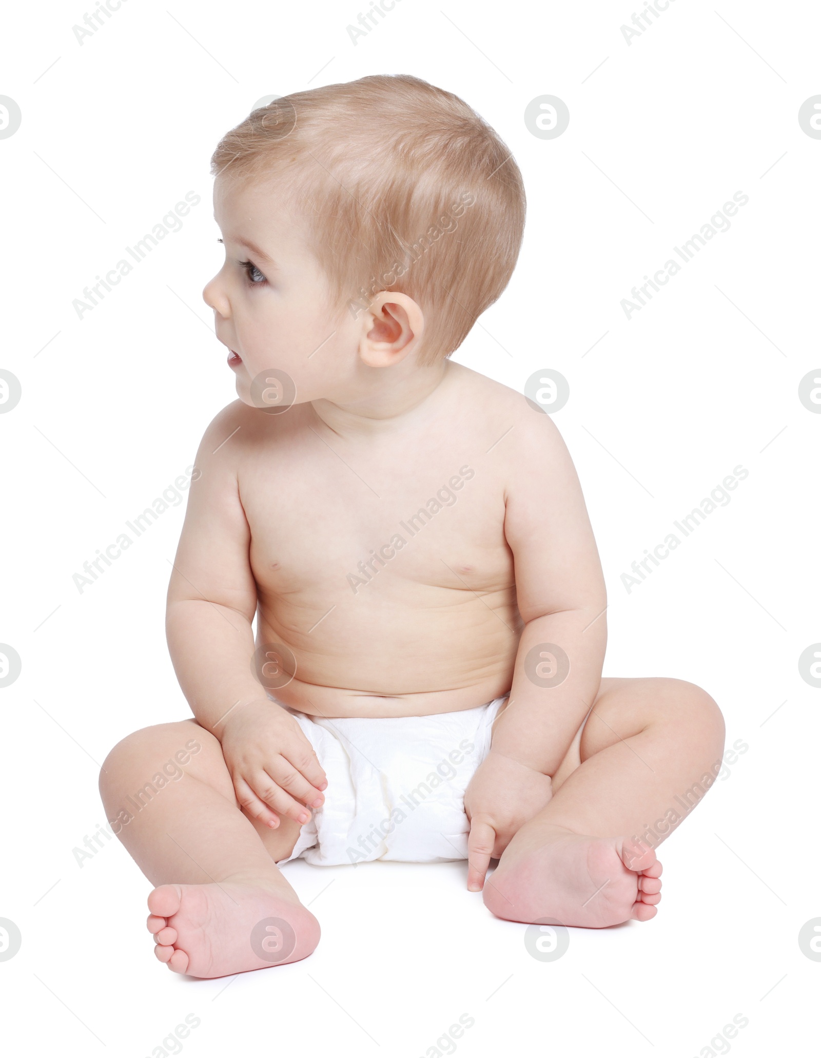 Photo of Cute little baby sitting on white background