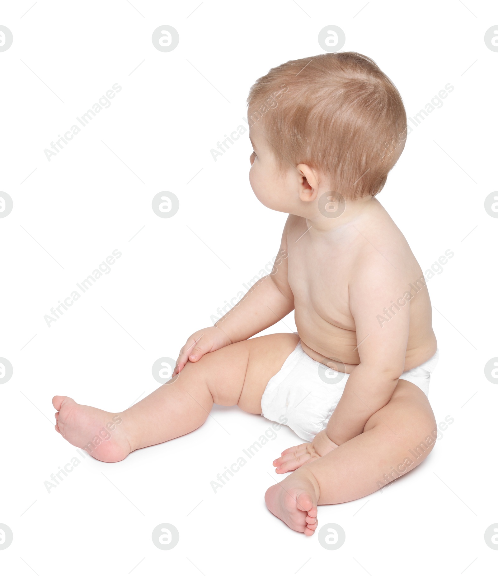 Photo of Cute little baby sitting on white background