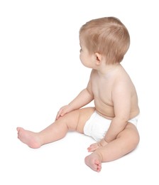 Photo of Cute little baby sitting on white background