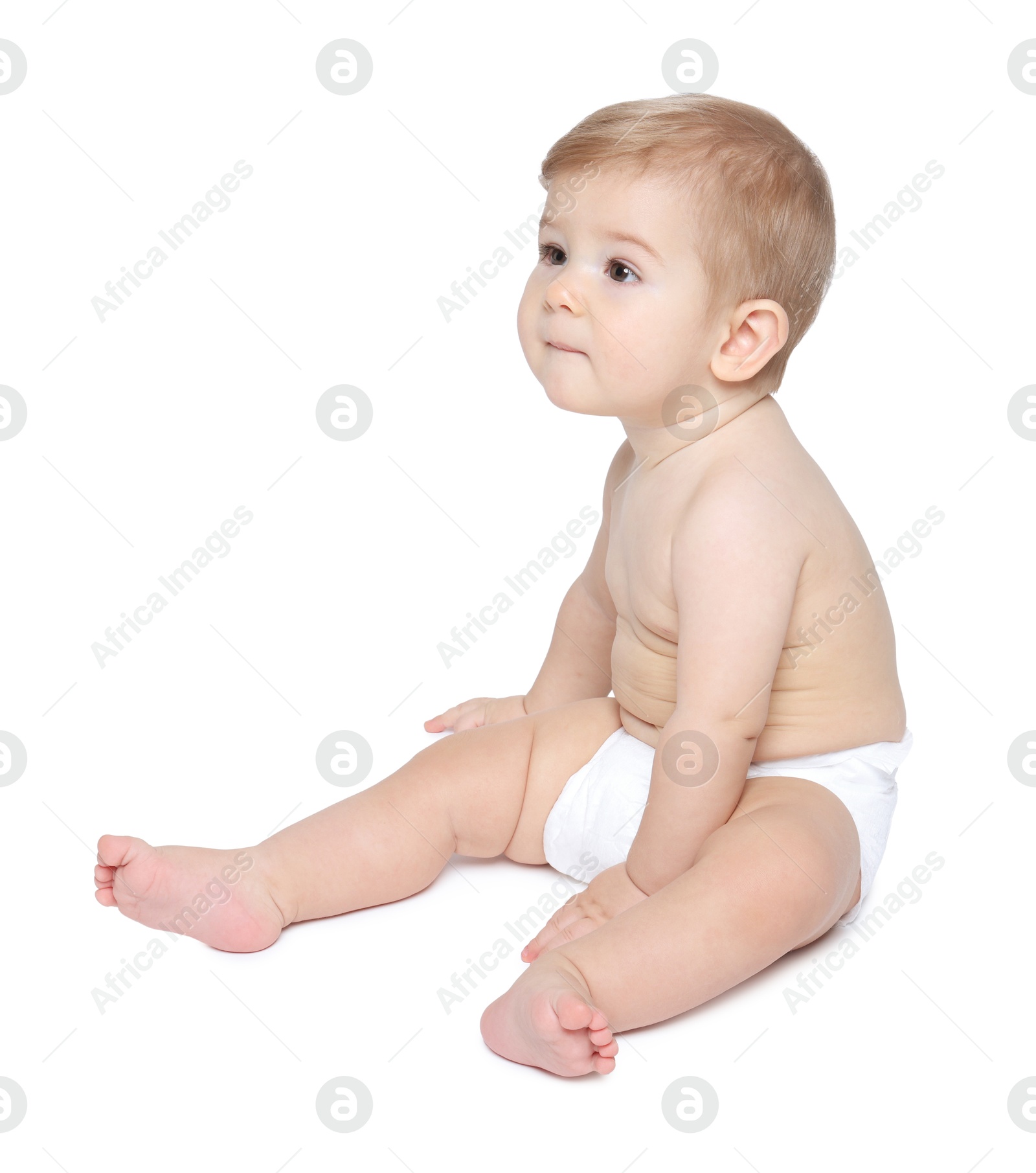 Photo of Cute little baby sitting on white background