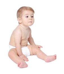 Photo of Cute little baby sitting on white background