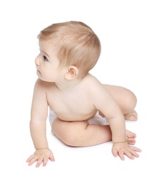 Photo of Cute little baby in diaper on white background