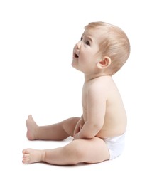 Photo of Cute little baby sitting on white background