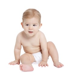 Photo of Cute little baby sitting on white background