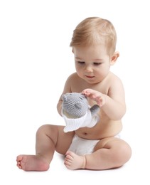 Photo of Cute little baby with toy on white background