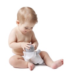 Photo of Cute little baby with toy on white background