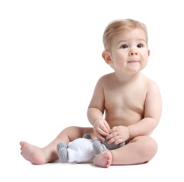 Photo of Cute little baby with toy on white background