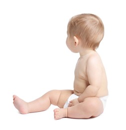 Photo of Cute little baby sitting on white background