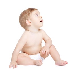 Photo of Cute little baby sitting on white background