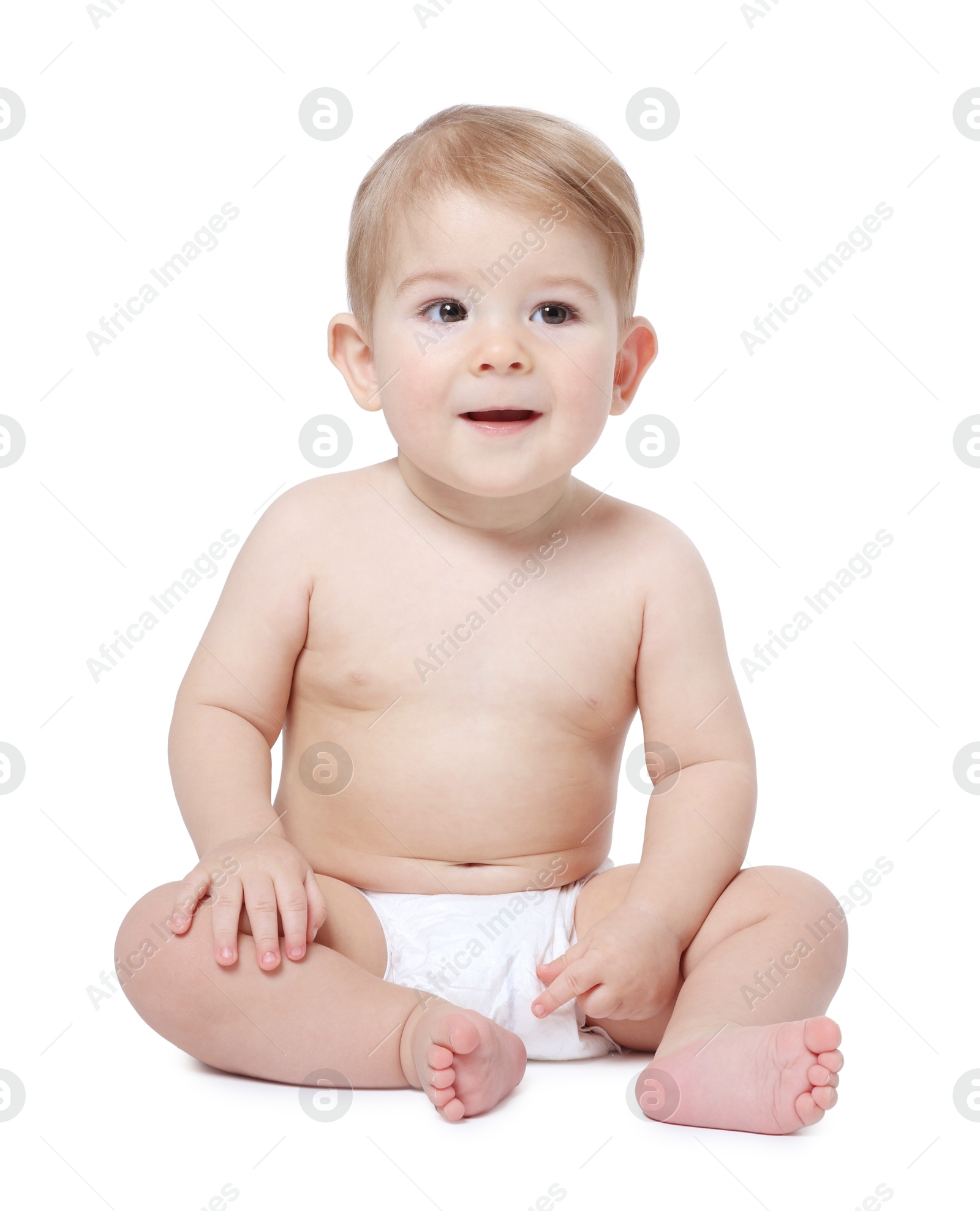 Photo of Cute little baby sitting on white background