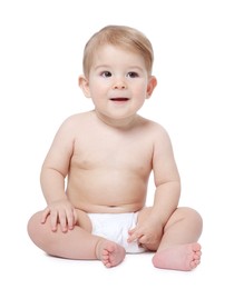 Cute little baby sitting on white background