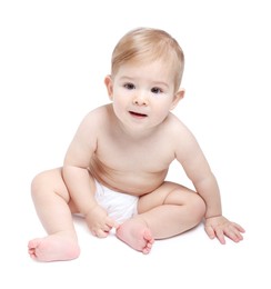 Photo of Cute little baby sitting on white background