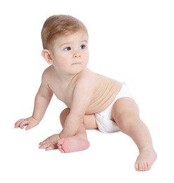 Photo of Cute little baby sitting on white background