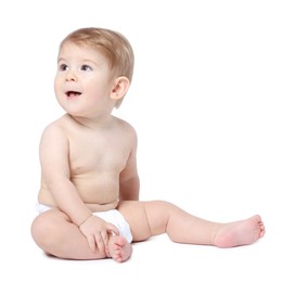 Photo of Cute little baby sitting on white background