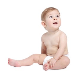 Photo of Cute little baby sitting on white background