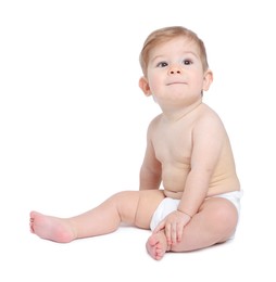 Cute little baby sitting on white background