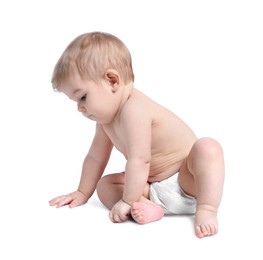 Photo of Cute little baby sitting on white background